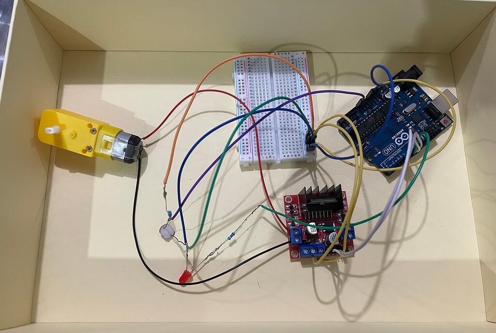 Program code for ldr that connect with dc motor and lamp - General ...