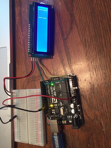 I2C LCD not displaying characters, instead flashing blocks across ...