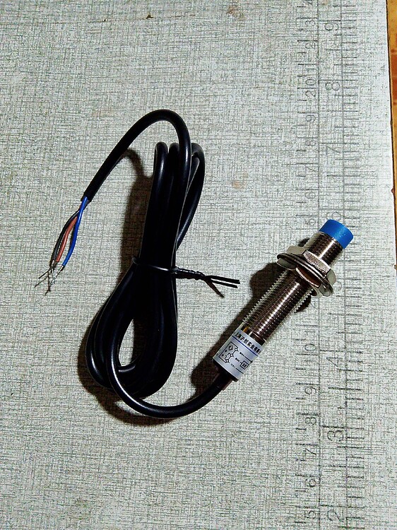 How can you adjust the range of a inductive proximity sensor? BADLY ...