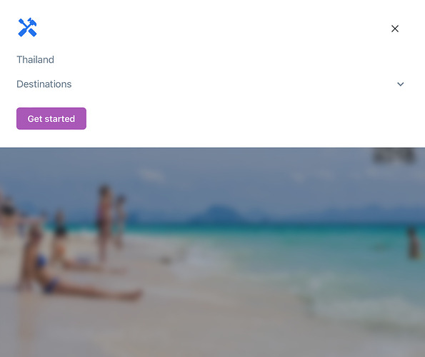 A website interface displays a menu with travel options for Thailand and destinations, with a background image of a beach featuring people relaxing and playing by the turquoise sea. (Captioned by AI)