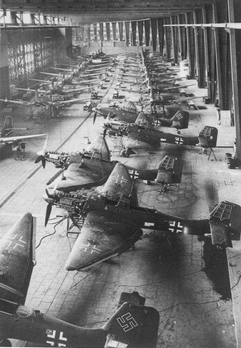 Assembly shop of the German Ju-87 dive bombers of the Weser-Flugzeugbau plant in the hangars of Tempelhof airport in Berlin, 1943.